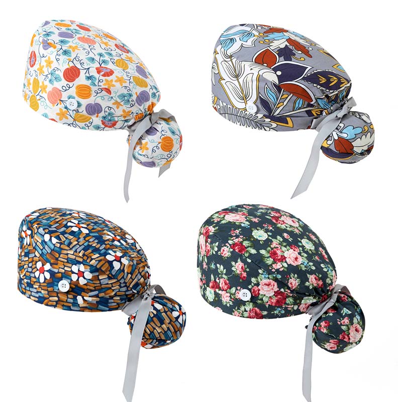 Four colorful ponytail scrub caps with unique patterns and gray ribbons